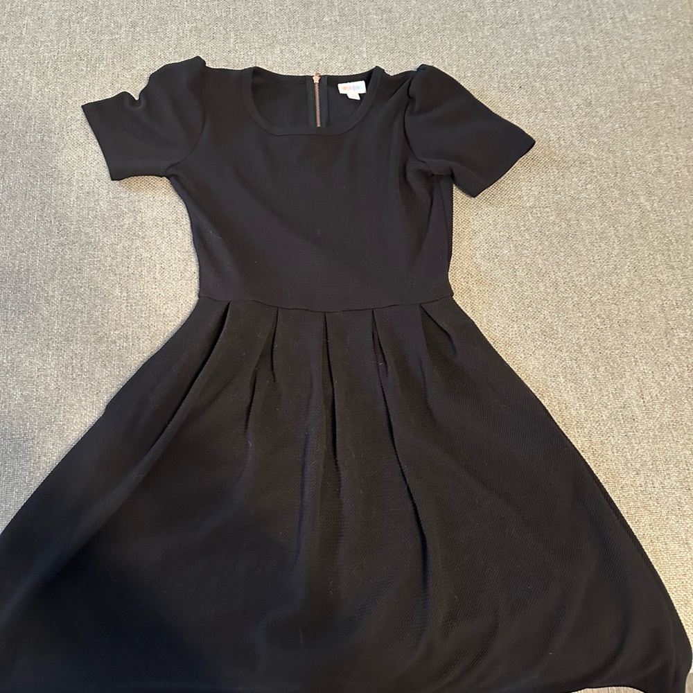 LuLaRoe noir collection Amelia. Size small NWT. Rose gold zipper